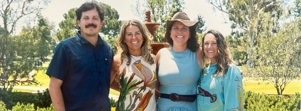 Josh Huttinger, Ann Huttinger, Caitlyn Coleman and Melissa Bann standing together outdoors.